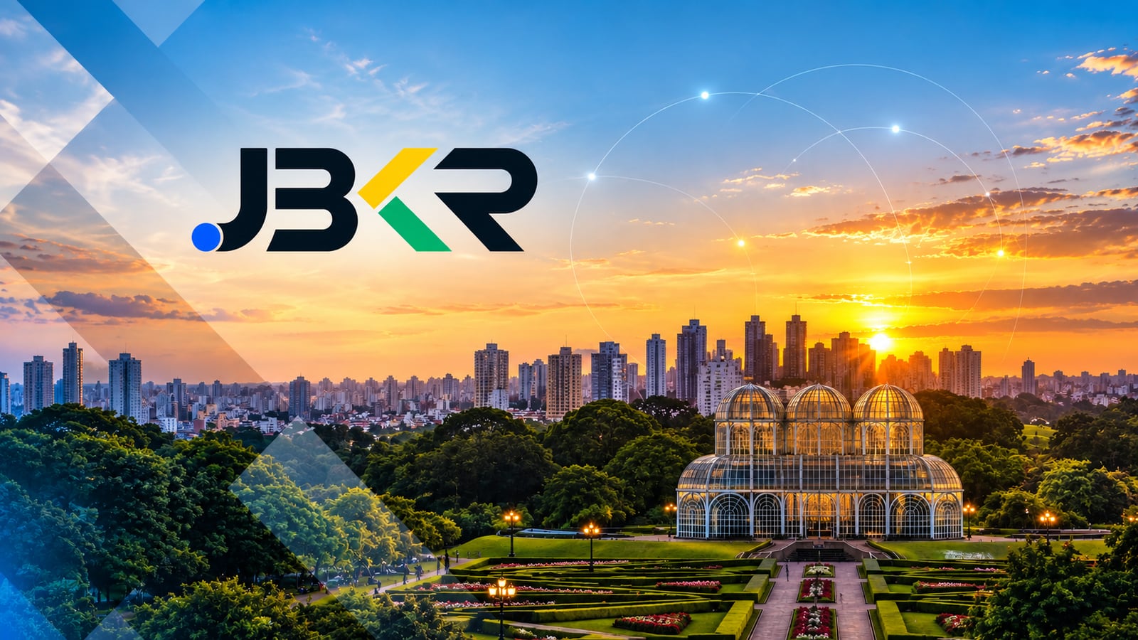 Estufa do Jardim Botânico de Curitiba ao pôr do sol, com a cidade ao fundo e a marca JBKR